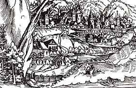 Bildausschnitt, in Holzschnitt-Technik ausgeführte Darstellung einer Landschaft; im Vordergrund ein Gebäude, an dem außen zwei Räder angebracht sind, im Hintergrund eine Ansiedlung von Häusern